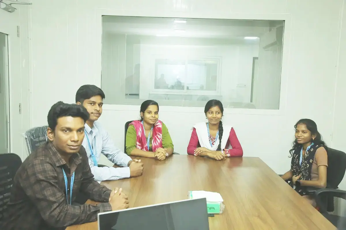 Quality assurance team reviewing manufacturing protocols