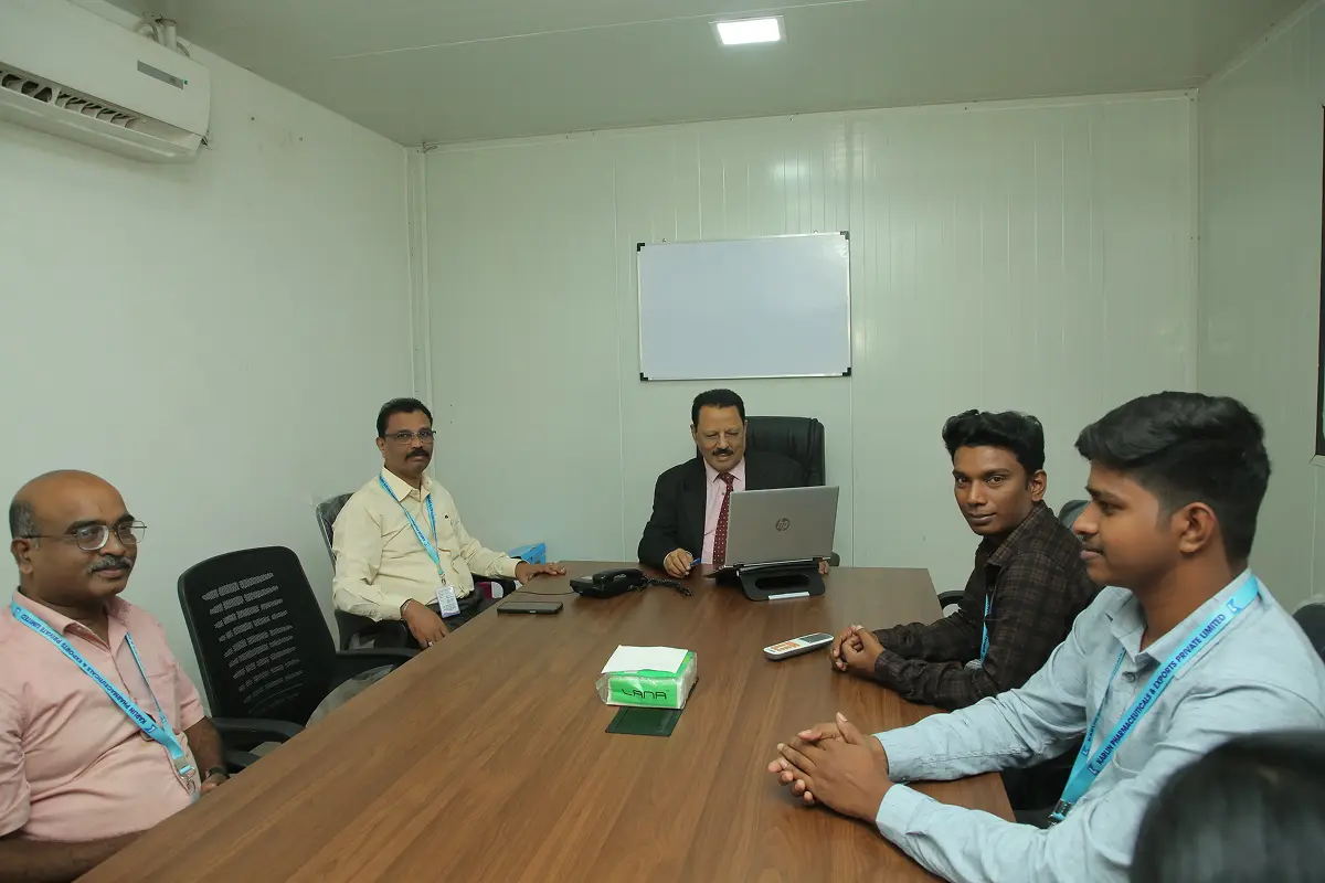 Dermatology research scientists working in laboratory